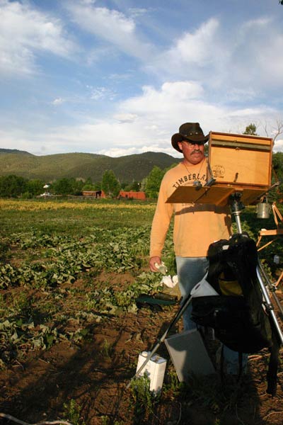 Image: Rich Gallego painting in a meadow